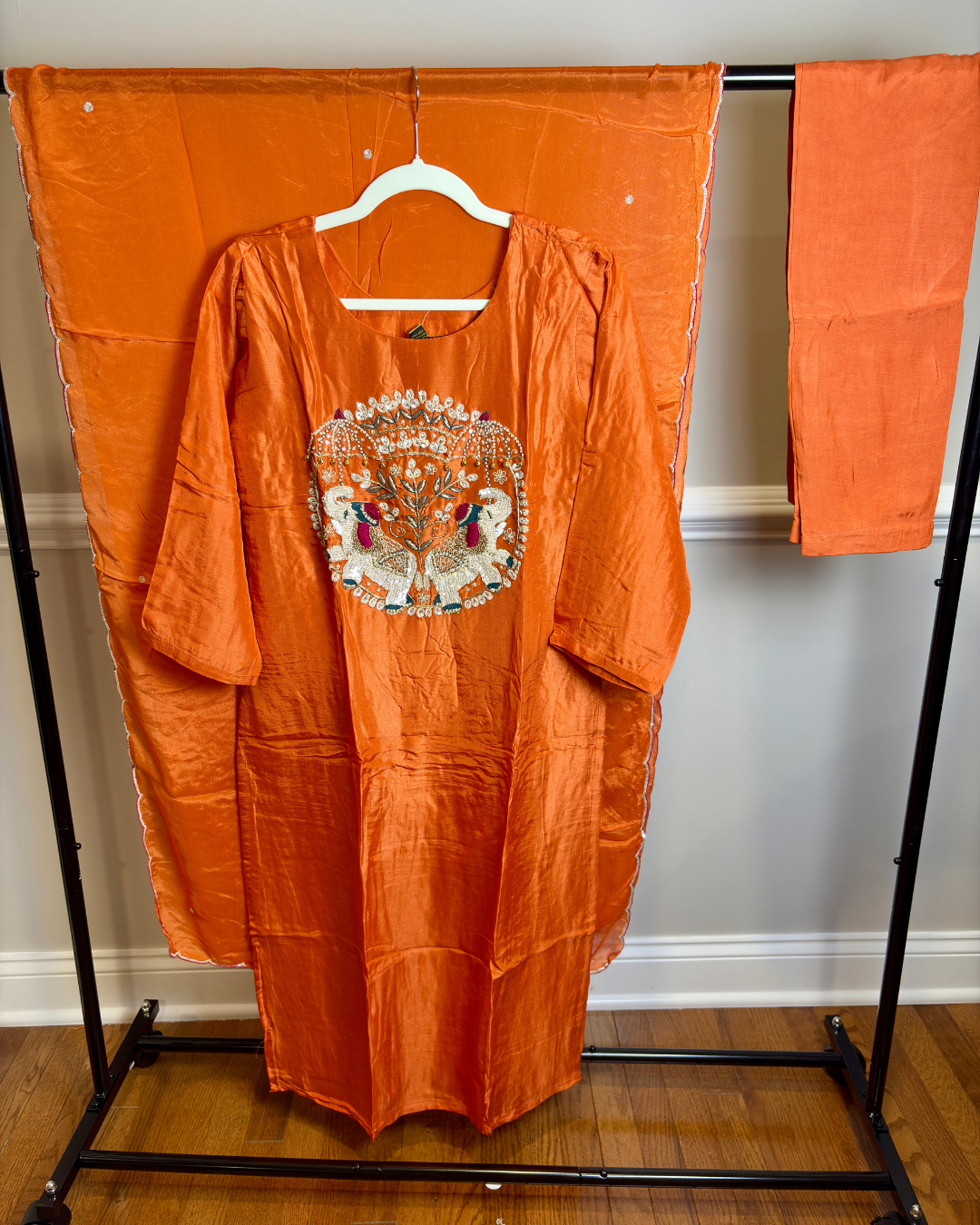 Orange 3-piece Dola Silk Suit Set with Hand Work Elephant and Scallop work Dupatta