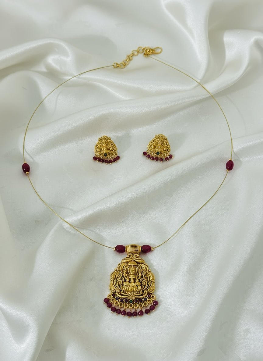 Ananya - Invisible Red Lakshmi Pendant Necklace Set with Matching Earrings