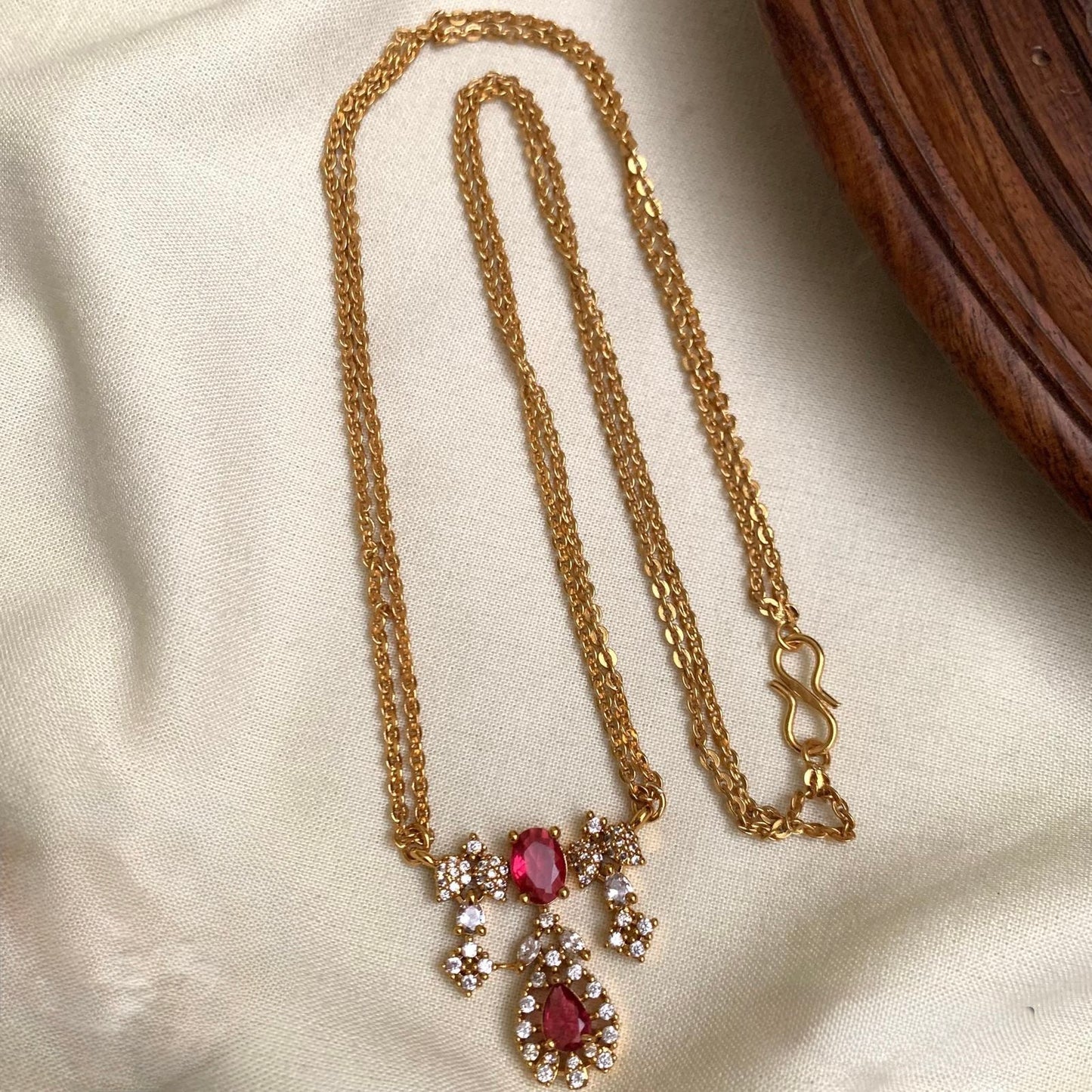 Neethu - Red Long Chain With AD Pendant