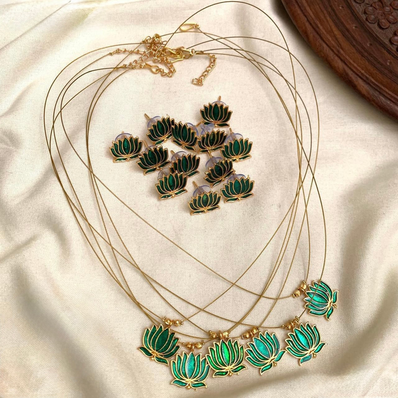 Neeraja - Invisible Green Lotus Pendant Necklace Set with Matching Earrings