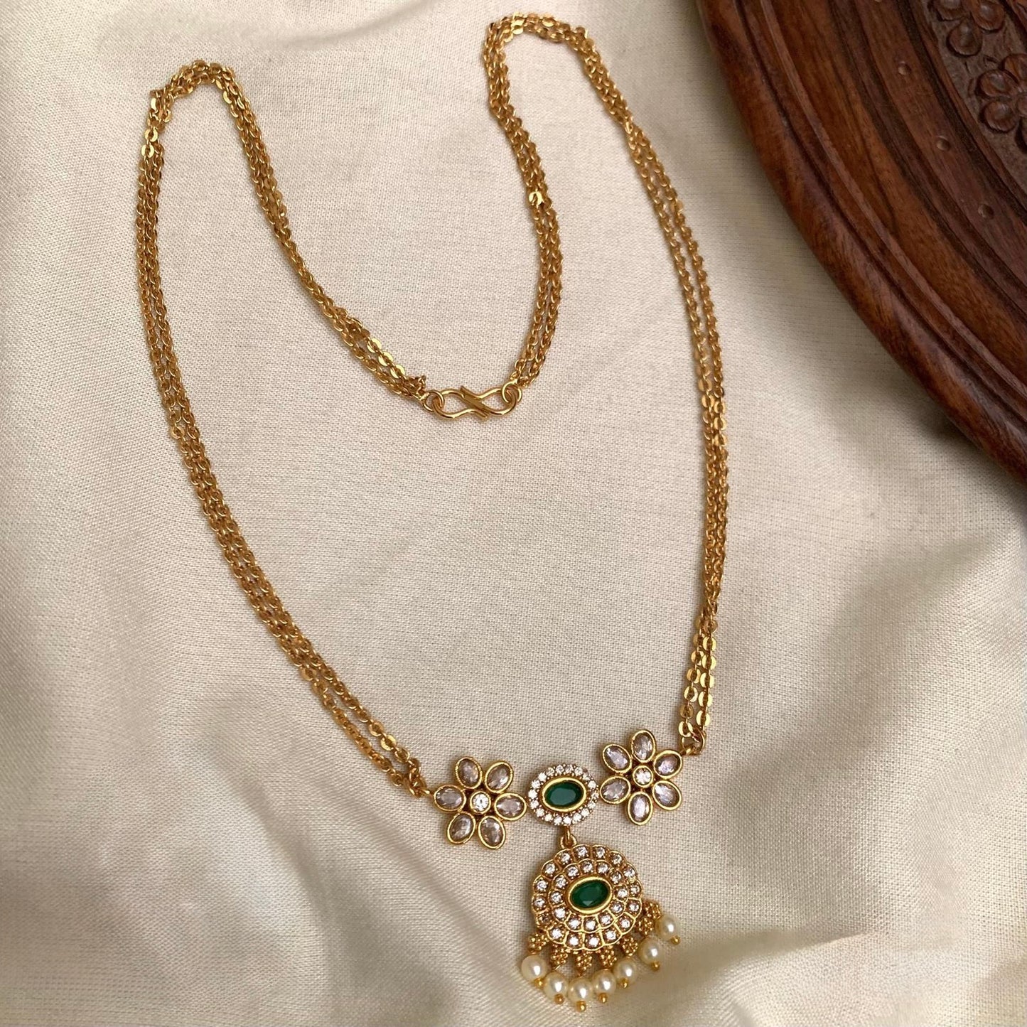 Neethu - Green and Golden Long Chain With AD Pendant