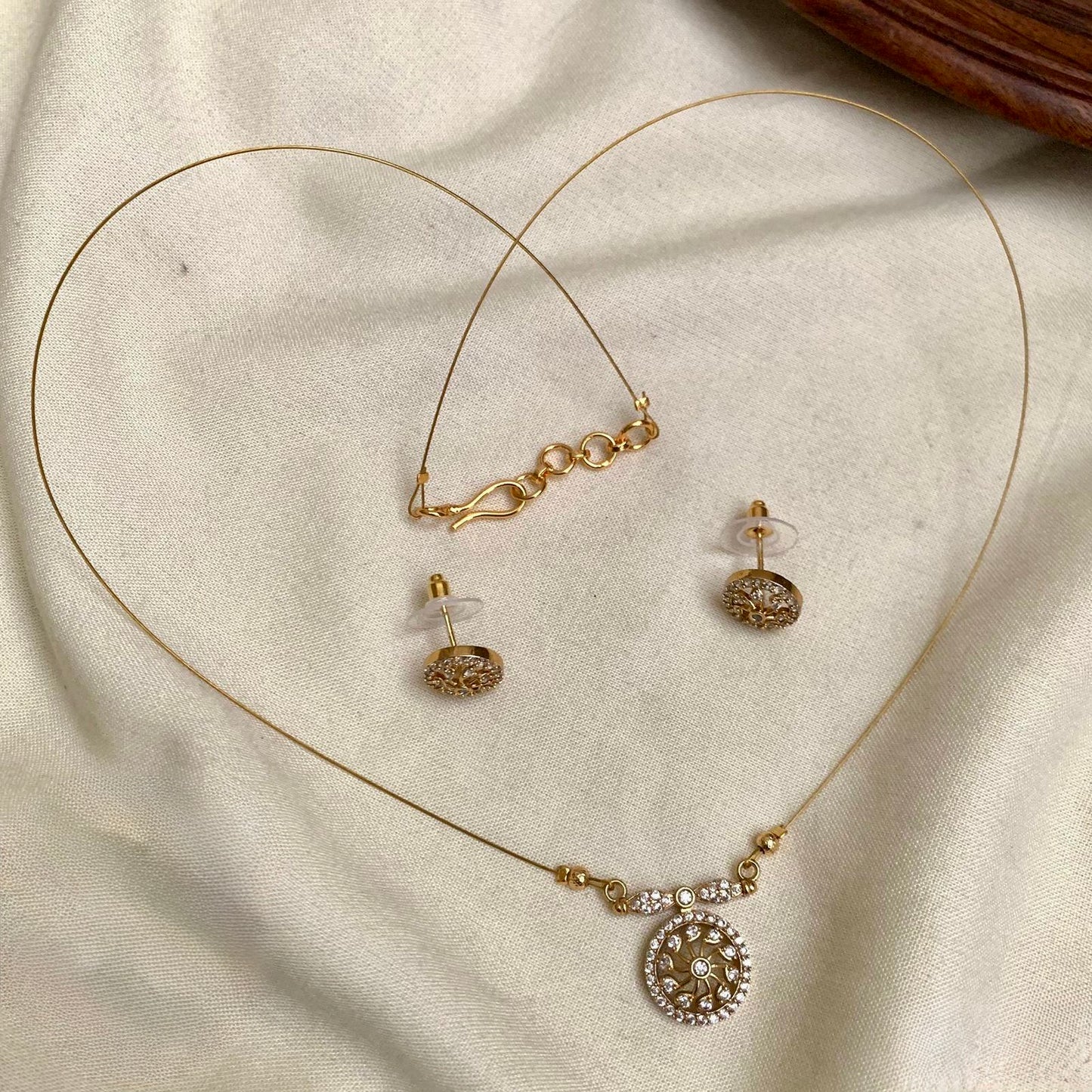 Niya - White Invisible Chain with AD Pendant and matching Earrings