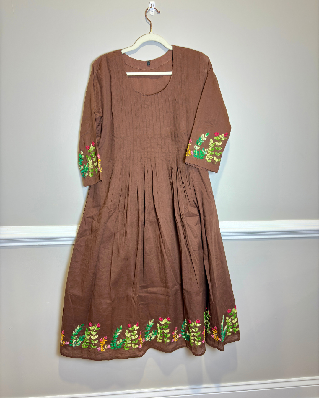 Brown flared Dress/Kurta with floral hand embroidery.