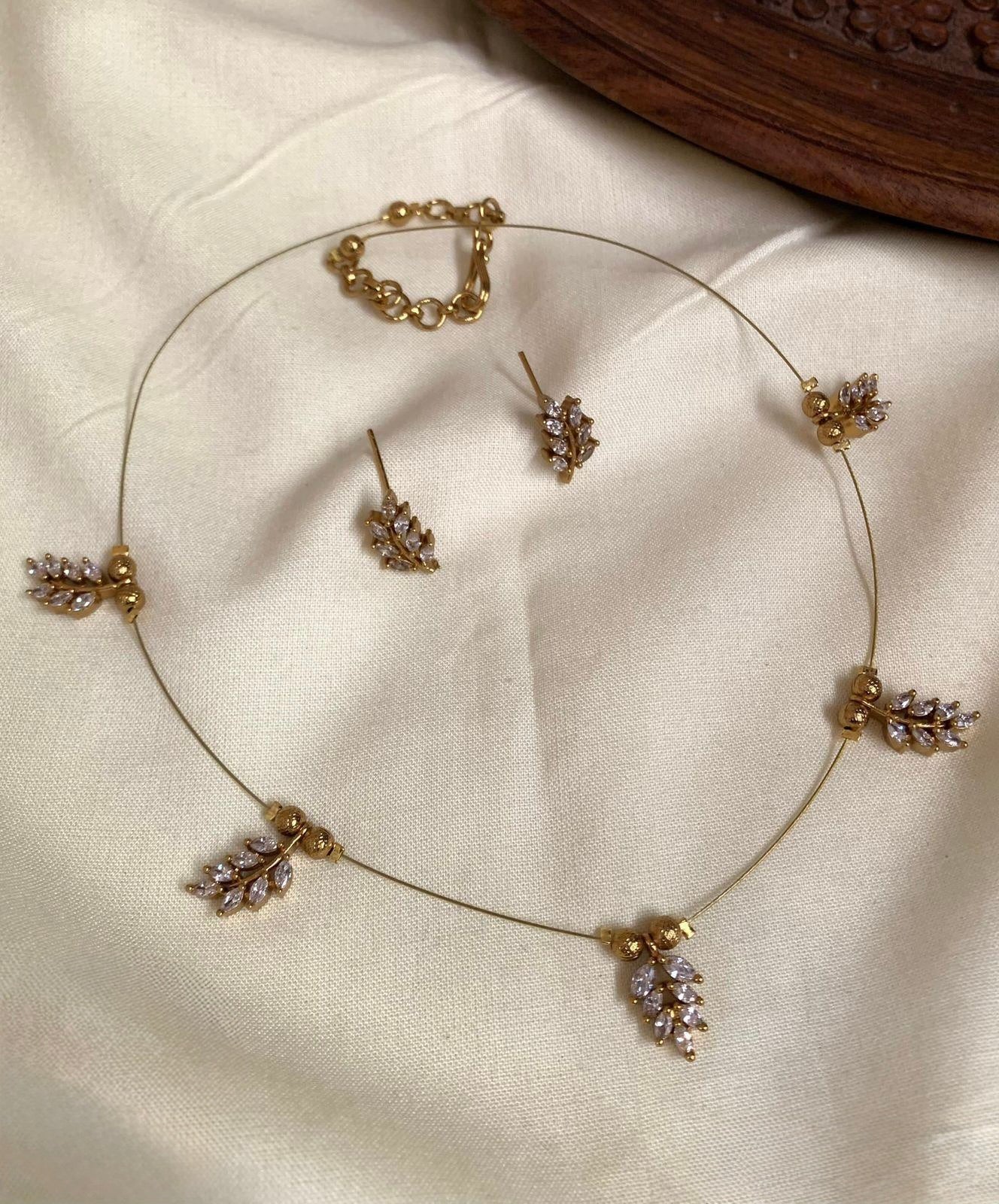Bhagyashree - Invisible AD White Stone Leaf Necklace with Matching Studs