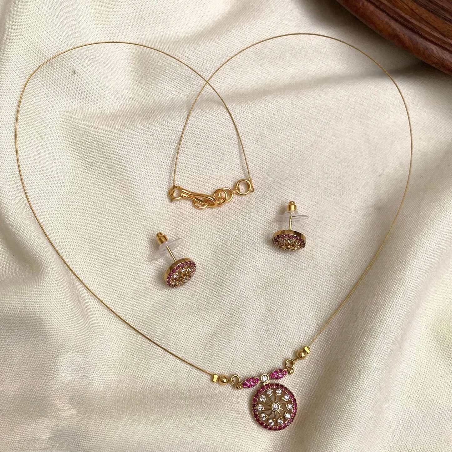 Niya - Red Invisible Chain with AD Pendant and matching Earrings