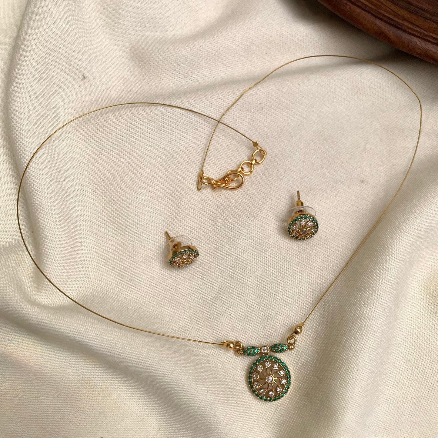 Niya - Green Invisible Chain with AD Pendant and matching Earrings