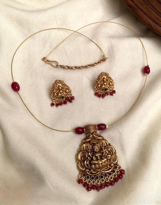 Ananya - Invisible Red Lakshmi Pendant Necklace Set with Matching Earrings